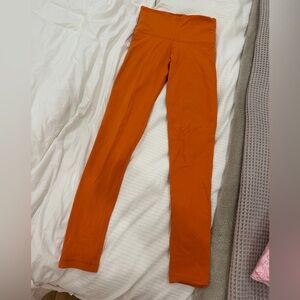 aritzia TNAlife atmosphere hi-rise 7/8 leggings XXS orange